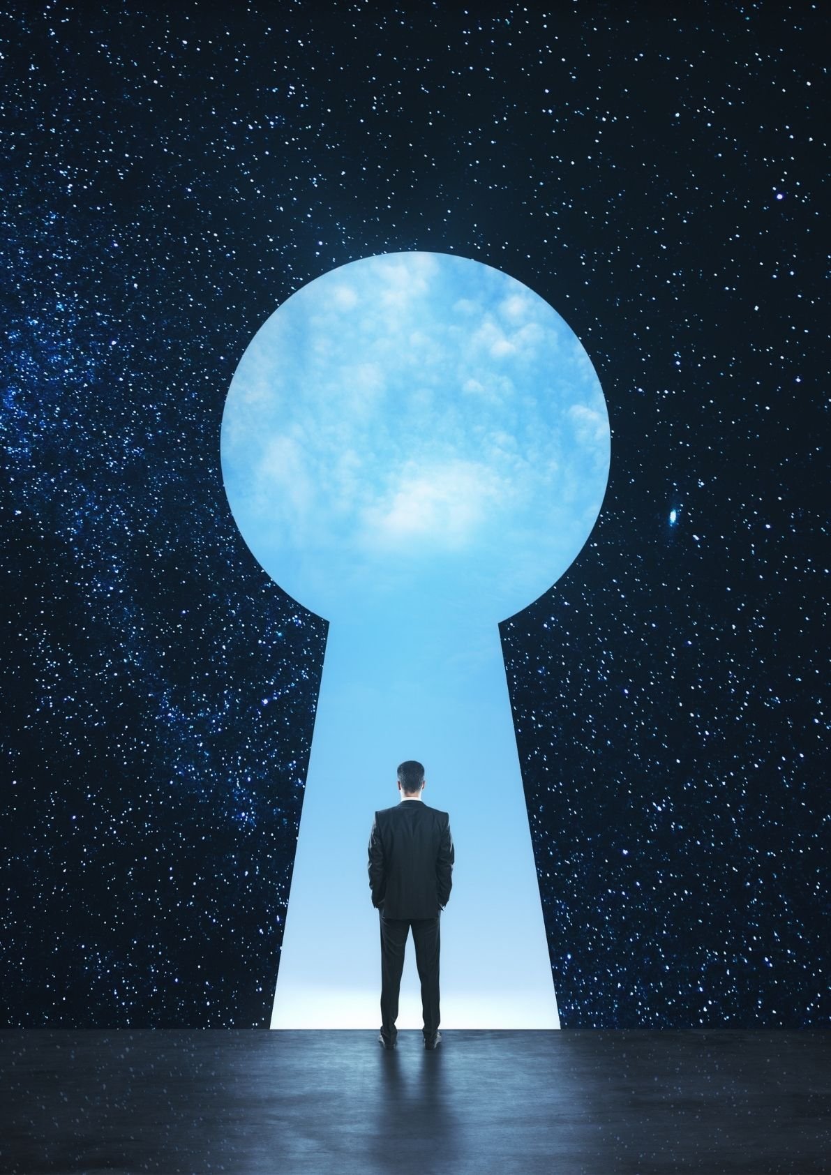 Silhouette of person standing in keyhole opening looking at starry sky representing future self
